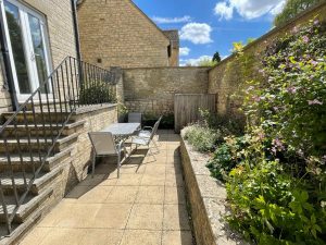 Courtyard garden, with ssteps from sitting room french doors